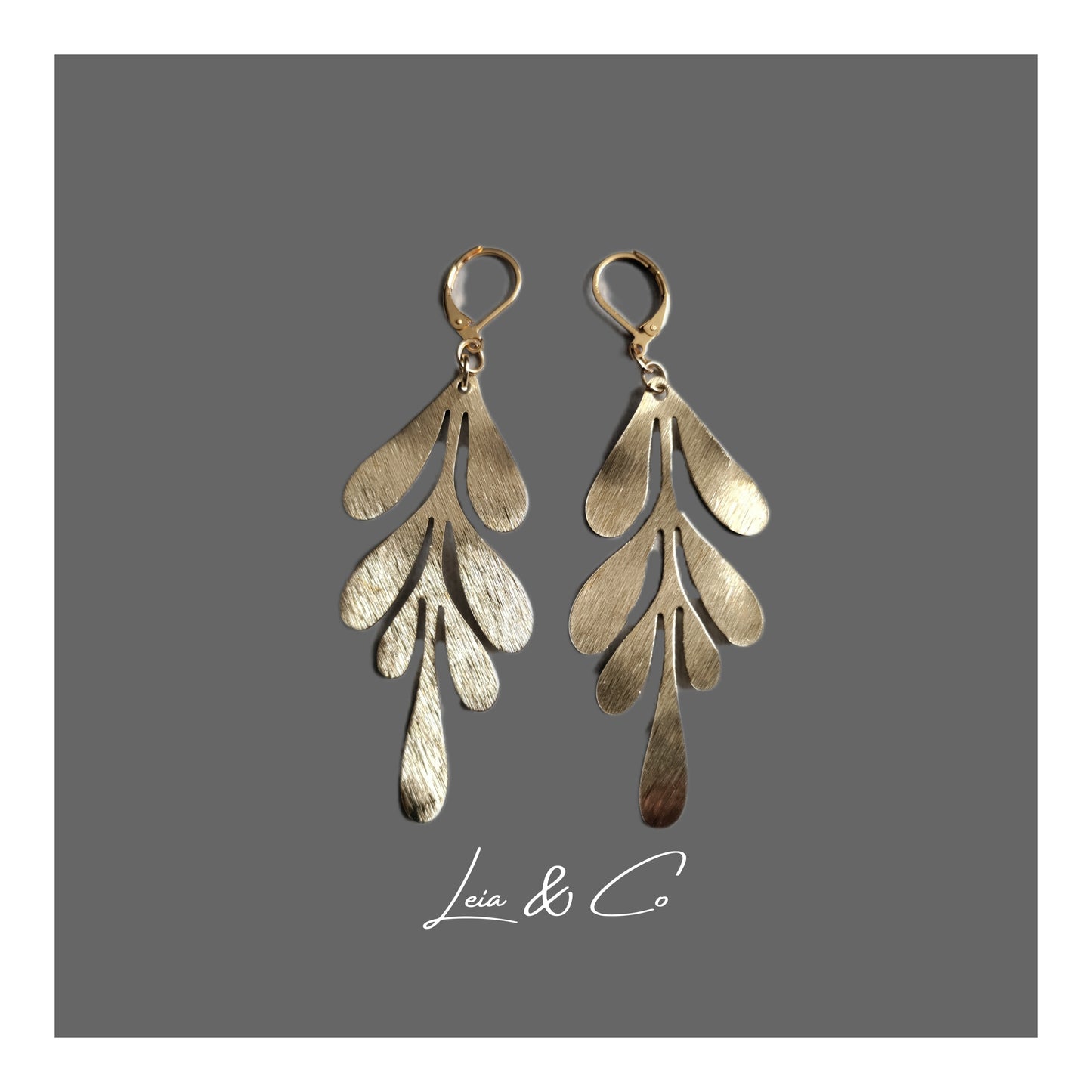 Boucles d'oreilles pendantes feuilles dorées LEIA&CO