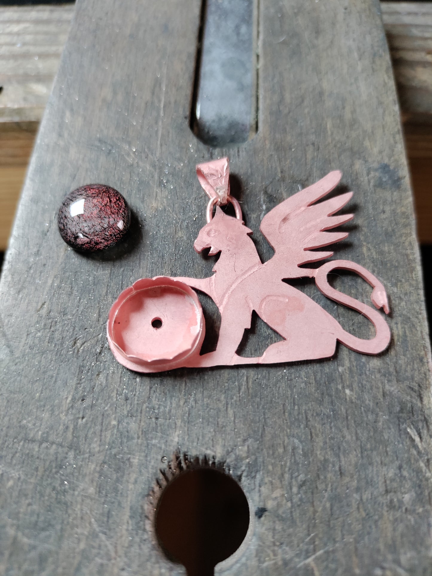 Golden Griffon pendant with red-pink dichroic glass globe LEIA&CO